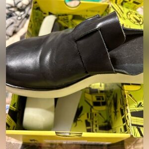 Fly London used black mules